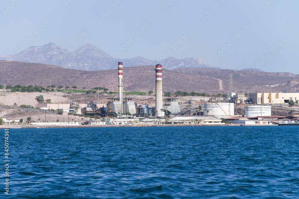 The Port of La Paz with its thermoelectric plant in the background generating energy for the state of Baja California Sur. MEXICO The Port of La Paz with its thermoelectric plant in the background generating energy for the state of Baja California Sur. MEXICO