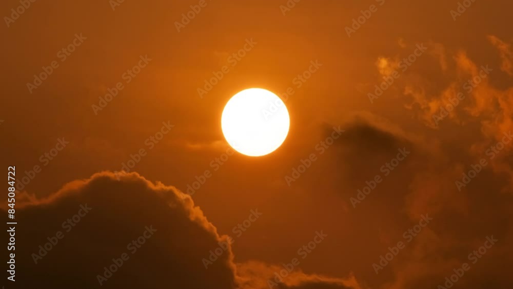 Timelapse of dramatic sunrise with orange sky in a cloudy day. Timelapse of dramatic sunrise with orange sky in a cloudy day.