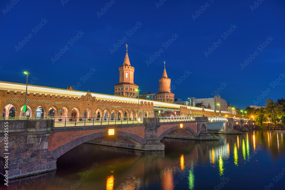 Berlin Germany, sunset city skyline at Oberbaum Bridge and Spree River Berlin Germany, sunset city skyline at Oberbaum Bridge and Spree River