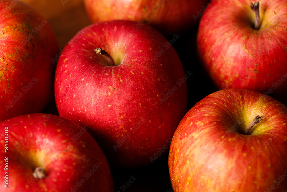 Ripe organic red apple on wooden table background. Ripe organic red apple on wooden table background.