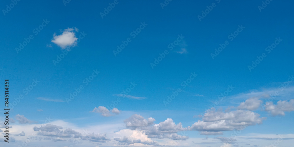 White cumulus clouds in blue sky over sea landscape, big cloud above ocean water panorama, horizon, beautiful tropical sunny summer day seascape panoramic view White cumulus clouds in blue sky over sea landscape, big cloud above ocean water panorama, horizon, beautiful tropical sunny summer day seascape panoramic view