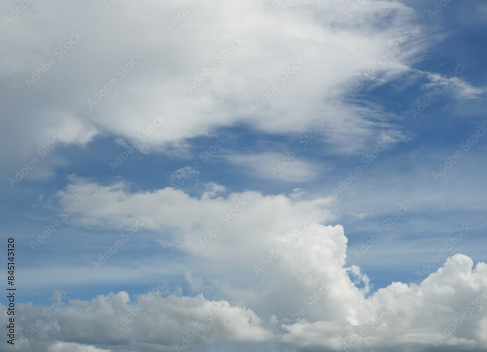 Cumulus cloud on beautiful blue sky in day light , Fluffy clouds formations at tropical zone