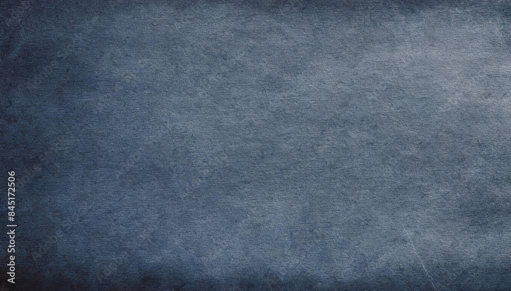 Handmade paper with a aged, rough, grainy, distressed texture in earthy blue tones with visible fibers, art rustic backgrounds. Handmade paper with a aged, rough, grainy, distressed texture in earthy blue tones with visible fibers, art rustic backgrounds.