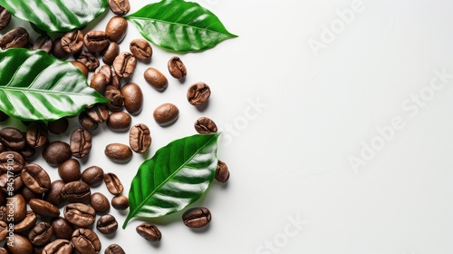 Coffee beans and green leaves roasted on a white background