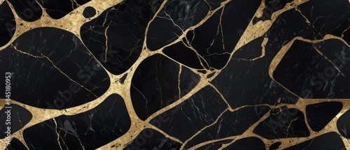 Panel kuchenny z motywem A black and gold marble texture background with swirling patterns
