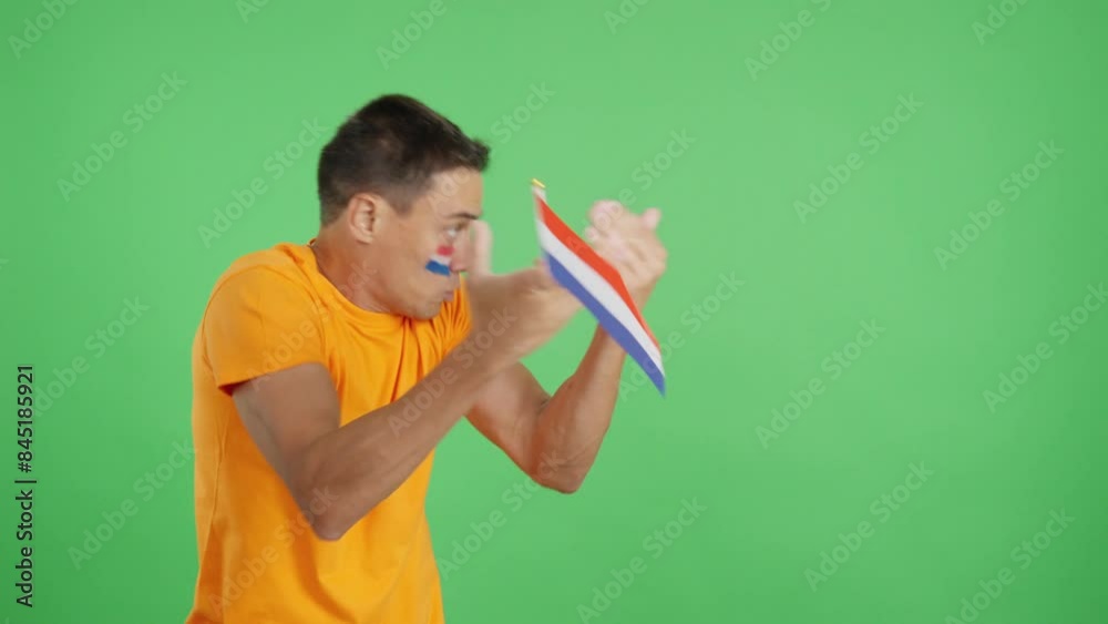 Man cheering for Holland, angry with the decision of referee Man cheering for Holland, angry with the decision of referee