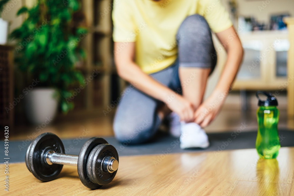 Morning Workout Routine In Home Gym. Fitness Motivation And Muscle Training Concept. Athlete Starting Exercise With Dumbbell Weight. Morning Workout Routine In Home Gym. Fitness Motivation And Muscle Training Concept. Athlete Starting Exercise With Dumbbell Weight.