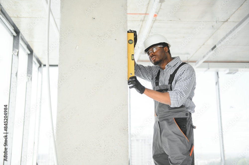 Portrait of a worker in a construction site Portrait of a worker in a construction site