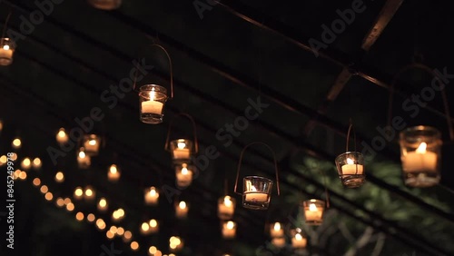 A Slow Motion Shot of Candles at Indian Wedding Decoration in India photo