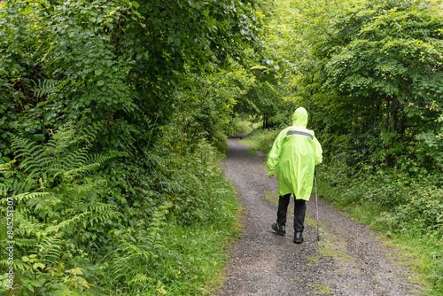 Way of St. James. Pilgrim protected from the rain on the way to Roncesvalles © Néstor MN
