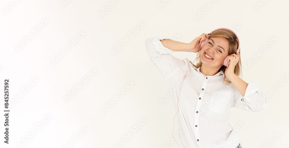 Photo of adorable sweet girl dressed white shirt enjoying songs headphones isolated white color background Photo of adorable sweet girl dressed white shirt enjoying songs headphones isolated white color background
