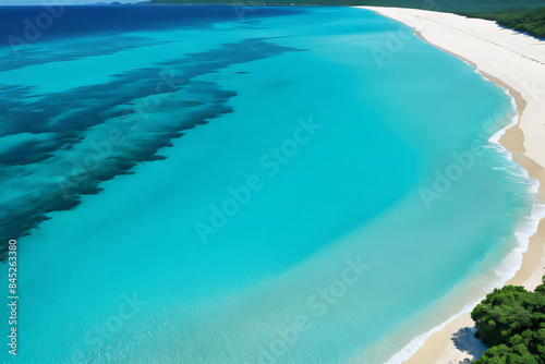 A beautiful tropical beach with turquoise waters and sandy shores under a sunny sky