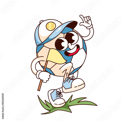 Groovy soccer ball cartoon character walking with flag on stadium. Funny retro with smile and baseball cap, goal and championship mascot, cartoon ball sticker of 70s 80s style vector illustration