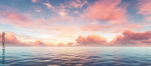 A serene ocean at sunset adorned with vibrant clouds against a sky backdrop The calm sea blends harmoniously with the colors of a sunrise sky. Creative banner. Copyspace image