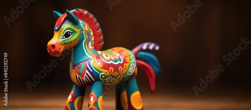 Colorful handcrafted toy resembling a horse a traditional Pohela Boishakh artwork perfect for children with copy space for advertising purposes