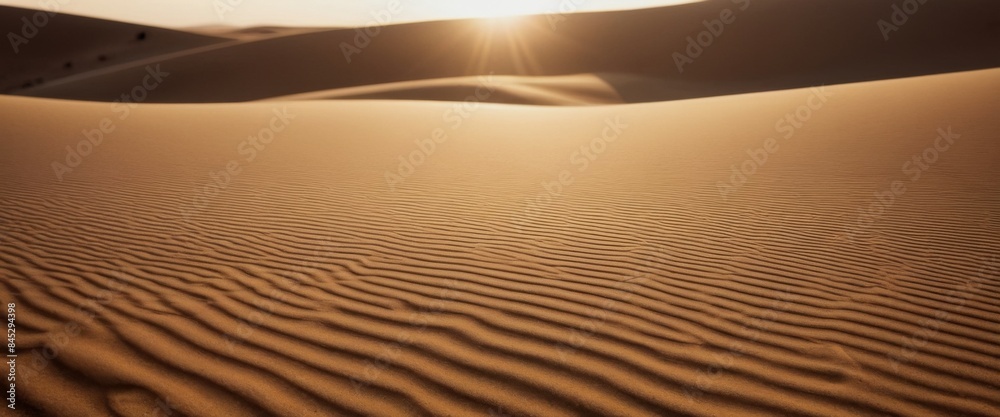 Naklejka premium Abstract golden sand dunes rippling patterns windswept texture