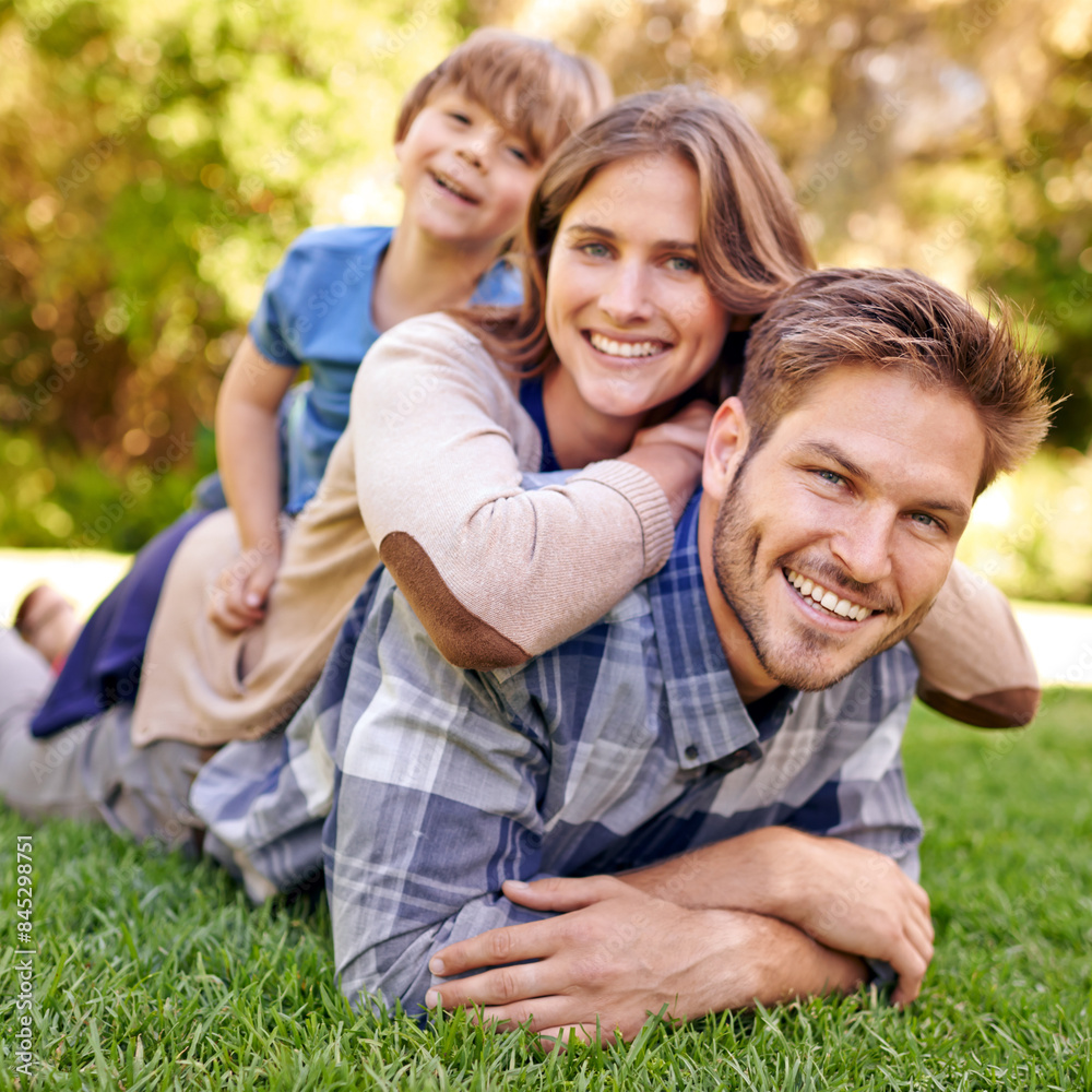 Outdoor, portrait and family relax on grass with happiness in countryside of New York for holiday. Child, mother and father together with love in hometown for break to bonding, smile and enjoy Outdoor, portrait and family relax on grass with happiness in countryside of New York for holiday. Child, mother and father together with love in hometown for break to bonding, smile and enjoy