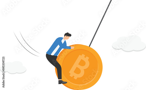 Bitcoin and cryptocurrency volatility, investment and speculation risk, price fluctuation and uncertainty, crypto value swing up and down, businessman trader holding swing unstable Bitcoin symbol.

