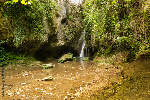 Park of Molina waterfalls in a sunny day - Fumane - Verona - taly photo