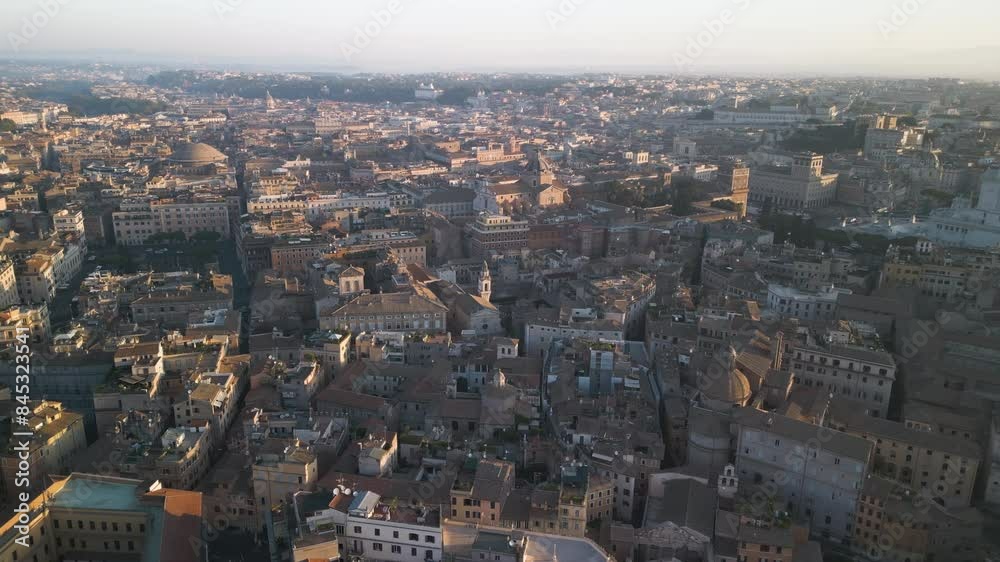 Panoramic aerial overview of sunset light across historic homes of the Orange Garden Italy