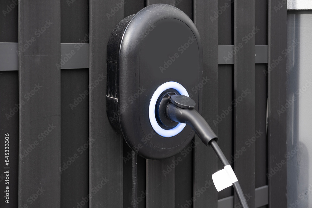 Power Charger electric vehicle, charging station with electricity through cable, electric vehicle in Europe, alternative energy, technology and innovation, green technology Power Charger electric vehicle, charging station with electricity through cable, electric vehicle in Europe, alternative energy, technology and innovation, green technology
