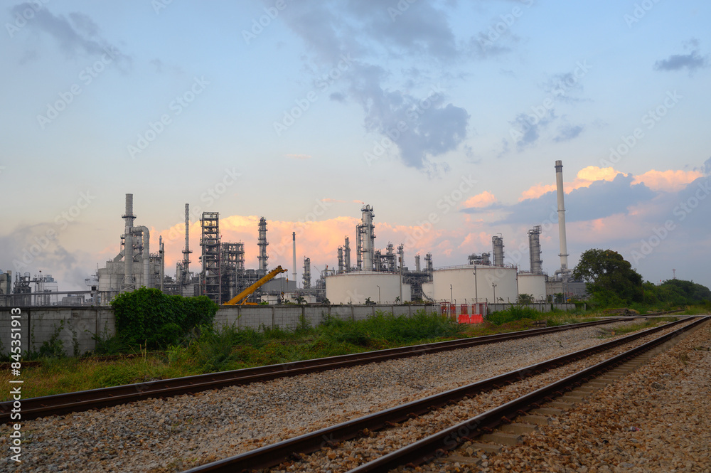 Oil refinery industry and Petrochemical and natural gas and oil storage tanks, blue background