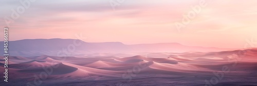 Capture tranquility of desert mornings with softfocus photography highlighting the subtle colors and textures of the dawn landscape © Abdul