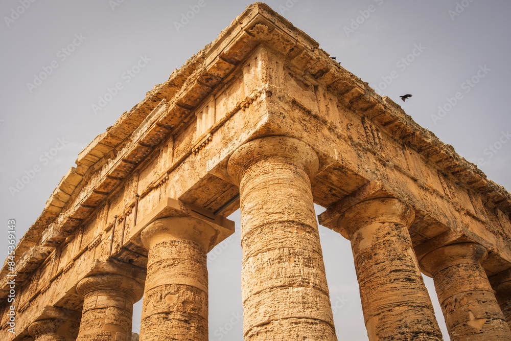 Archaeological Park of Segesta ruins in Sicily , detail of the main temple in Italy at sunset Archaeological Park of Segesta ruins in Sicily , detail of the main temple in Italy at sunset