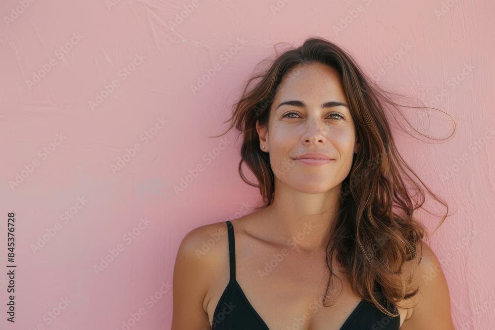 A close up portrait of a woman with a subtle smile A close up portrait of a woman with a subtle smile