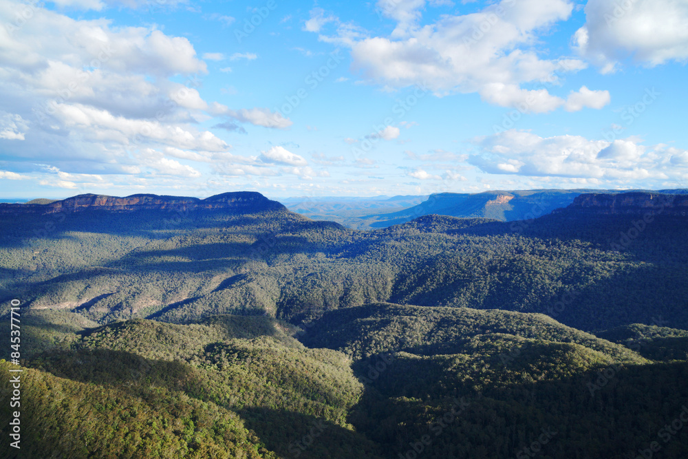 Naklejka premium Landscape of The Three Sisters are an unusual rock formation in the Blue Mountains National Park of Katoomba , New South Wales, Australia, on the north escarpment of the Jamison Valley - Nature Track