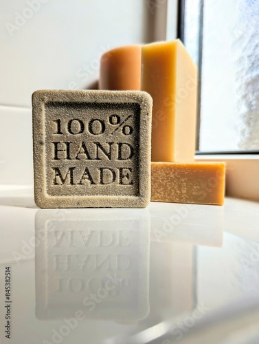 Obraz na płótnie Hand made soap, care and hygiene natural product closeup, white tiles aesthetic background w salonie
