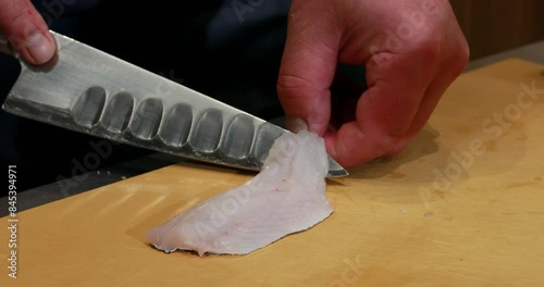 raw fish cut in pieces photo