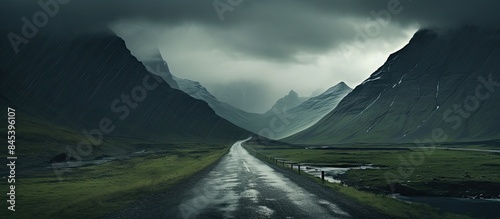 Road to the mountains gray clouds on top. Creative banner. Copyspace image