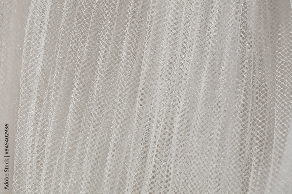 closeup of white corrugated organza textured background closeup of white corrugated organza textured background