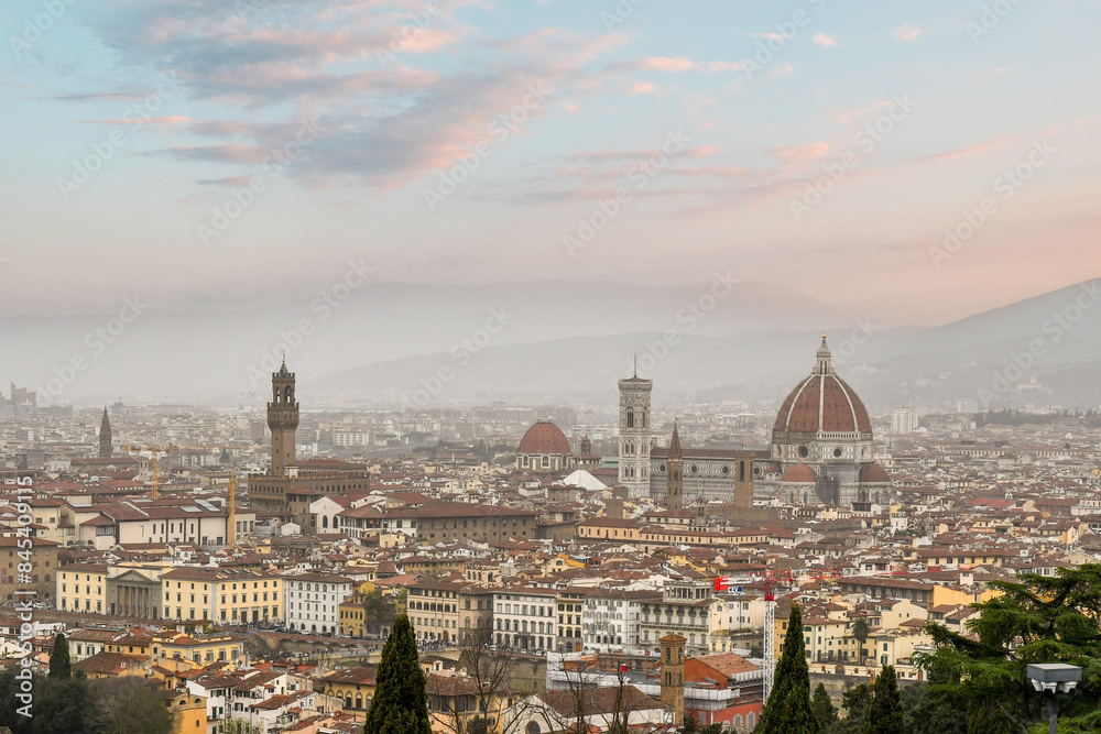Fototapeta premium Panorama of Florence with the Palazzo Vecchio, seat of the city hall, and the Cathedral of Santa Maria del Fiore at sunset, Tuscany, Italy