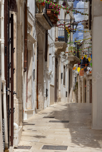 Obraz na płótnie Narrow, stone street typical of Mediterranean countries, Martina Franca, Italy, Puglia w salonie