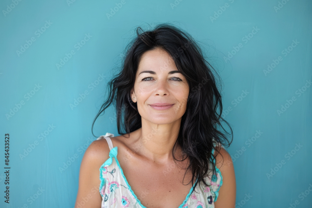 A close up portrait of a woman with a subtle smile A close up portrait of a woman with a subtle smile
