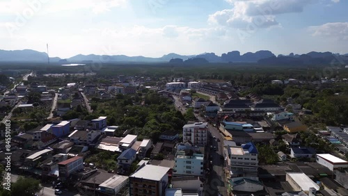 krabi town with temple monastery in city. Lovely aerial view flight drone photo