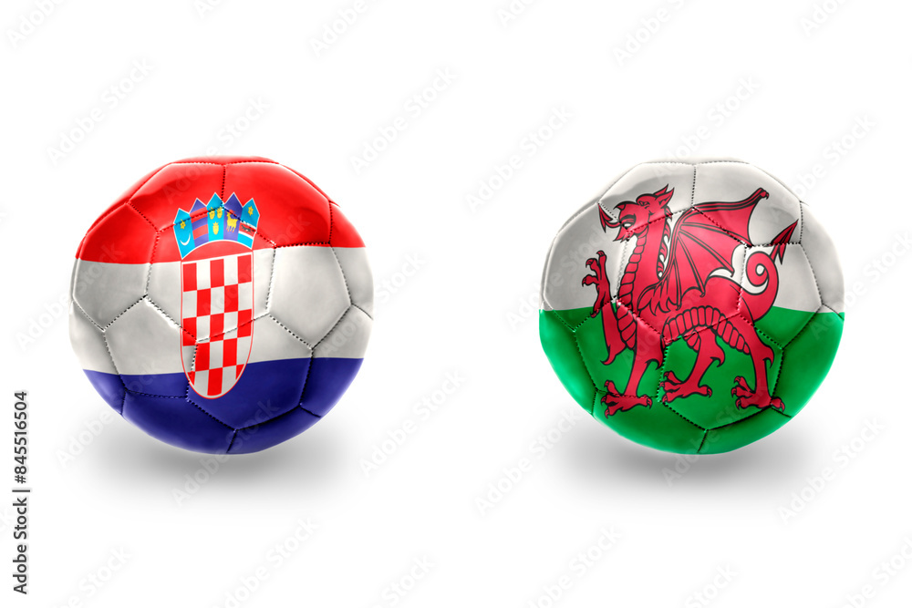 Obraz premium football balls with national flags of wales and croatia ,soccer teams. on the white background.