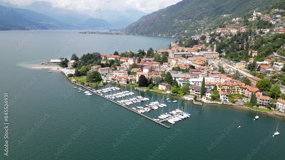Bellano and Varena are a csmall town on the eastern shore of Lake Como in the Province of Lecco in the Italian region Lombardy. Drone aerial view from Cammino del Viandante walking for tourist