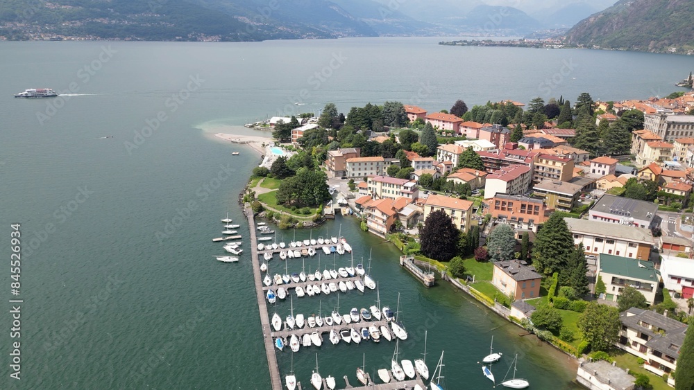 Bellano and Varena are a csmall town on the eastern shore of Lake Como in the Province of Lecco in the Italian region Lombardy. Drone aerial view from Cammino del Viandante walking for tourist