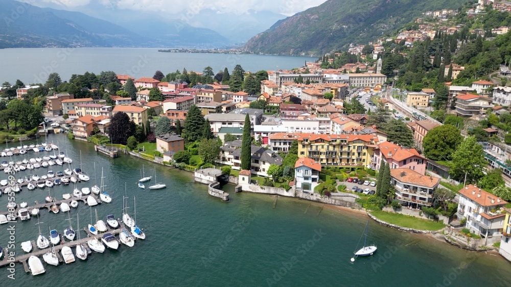 Bellano and Varena are a csmall town on the eastern shore of Lake Como in the Province of Lecco in the Italian region Lombardy. Drone aerial view from Cammino del Viandante walking for tourist