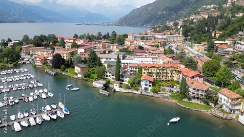 Obraz na płótnie Bellano and Varena are a csmall town on the eastern shore of Lake Como in the Province of Lecco in the Italian region Lombardy. Drone aerial view from Cammino del Viandante walking for tourist w salonie