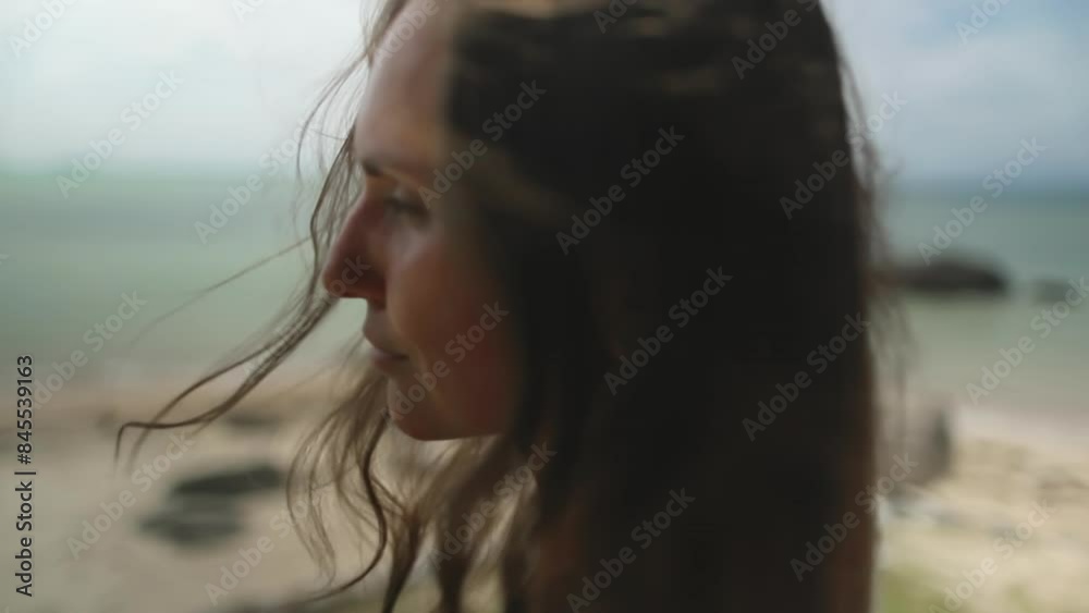 A woman in Thailand stands on the beach hotel terrace, looking wild nature ocean landscape. Travel holidays on tropical island in Thailand. Back view. Slow motion A woman in Thailand stands on the beach hotel terrace, looking wild nature ocean landscape. Travel holidays on tropical island in Thailand. Back view. Slow motion