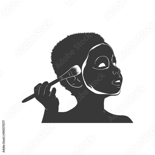 Silhouetted Woman Applying Face Mask with Brush, Skincare Treatment.