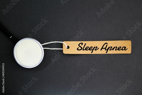 stethoscope and a paper tag with the word Sleep Apnea photo