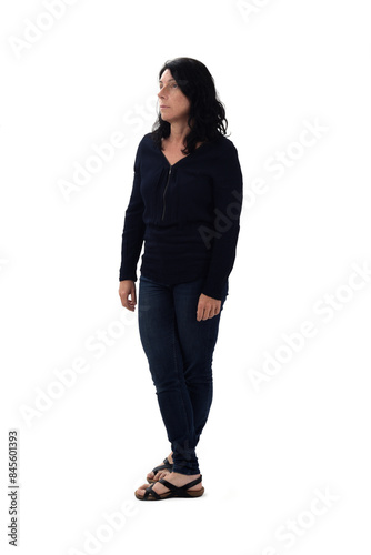 woman standing with legs crossed looking up on white background