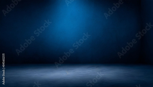 Wallpaper Mural Empty dark blue studio background with a grey concrete floor. Soft blue lighting creates a serene and modern ambiance, ideal for product display, presentations, or creating a minimalist visual effect Torontodigital.ca