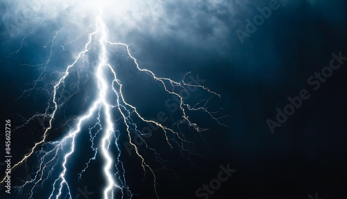 thunderstorm illuminating the night sky with powerful lightning strikes. The bright, jagged bolts of lightning contrast sharply against the dark clouds, symbolizing nature's raw, untamed power