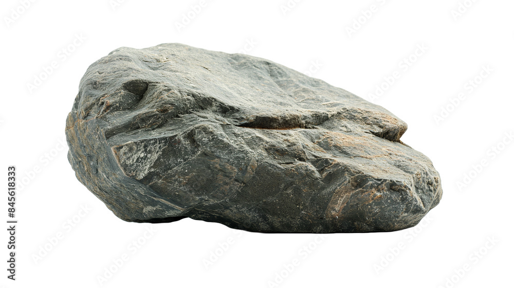 A cluster of stones on a dark backdrop, forming a pile. A cluster of stones on a dark backdrop, forming a pile.